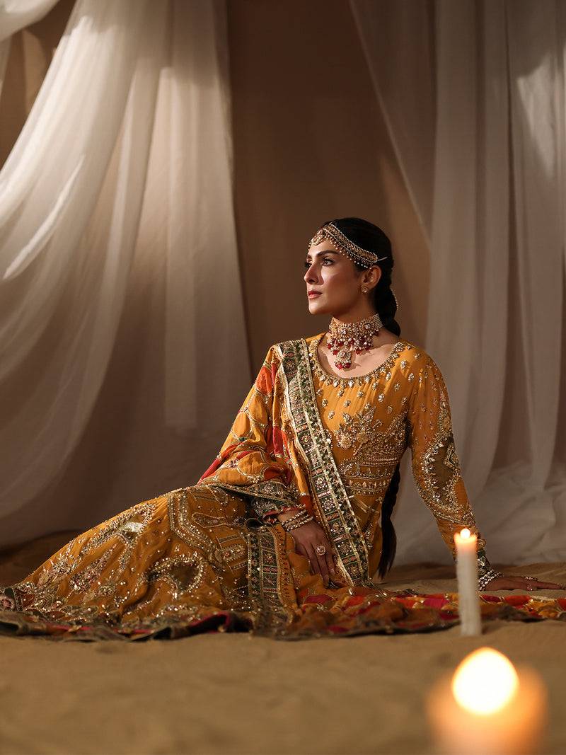 Gorgeous yellow wedding dress with rich embellishments and dupatta