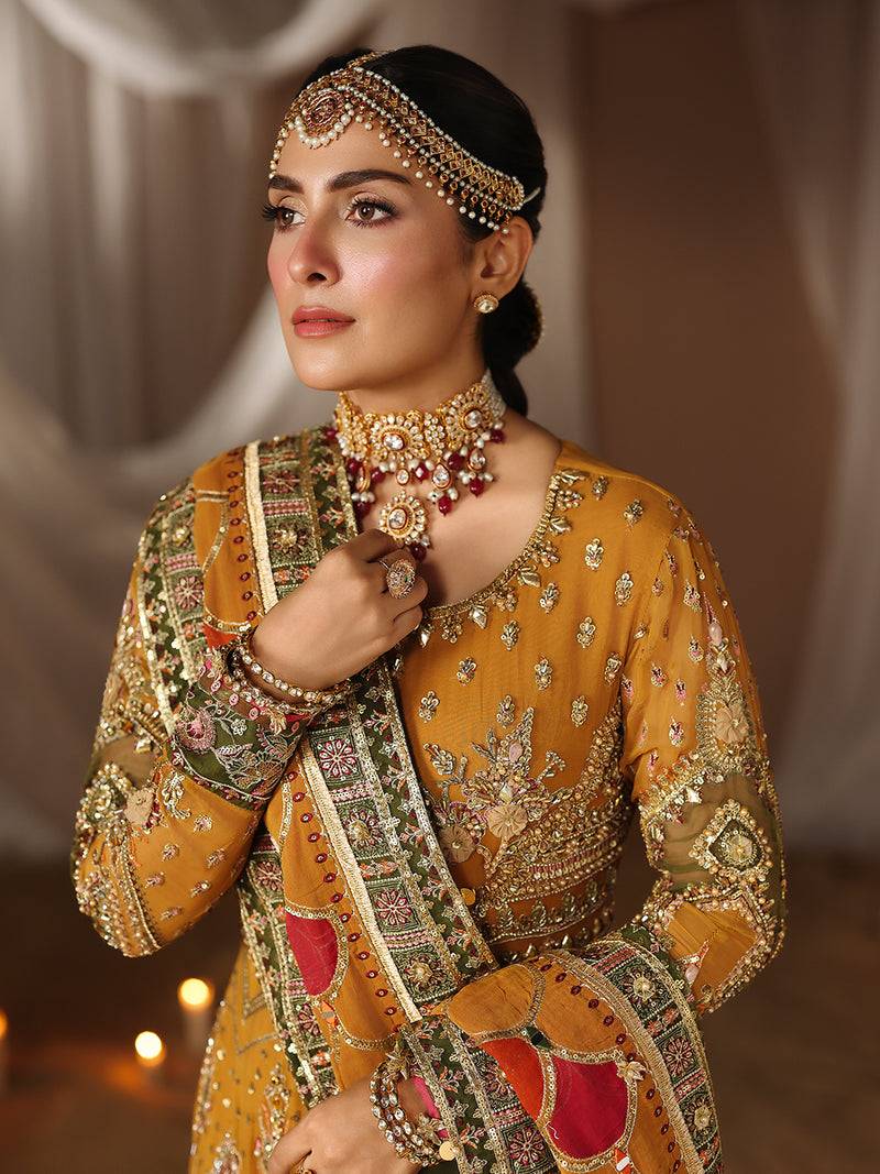 Elegant yellow wedding dress with intricate embroidery and dupatta