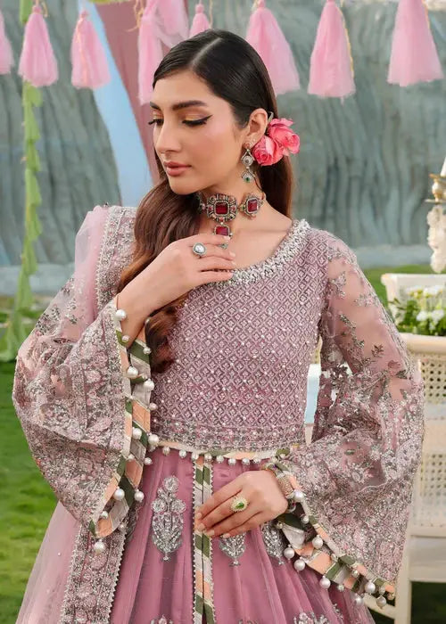 Close-up of PAKISTANI MAXI DRESS AR-4059 showing intricate sequin embroidery on bodice and sleeves, styled with statement jewelry for weddings.