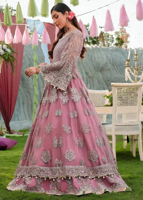 Side profile of PAKISTANI MAXI DRESS AR-4059 showcasing flared silhouette and detailed embroidery, suitable for wedding wear.