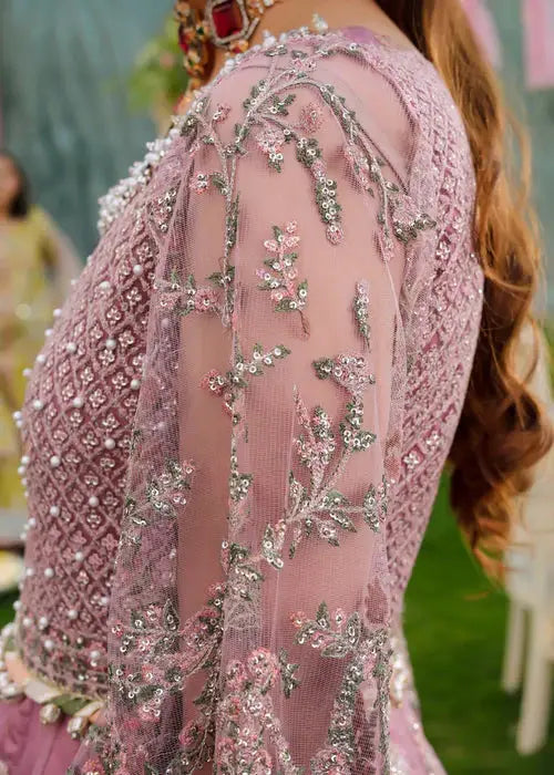Side sleeve view of PAKISTANI MAXI DRESS AR-4059 showing sheer net fabric with floral sequin work, ideal for formal occasions.