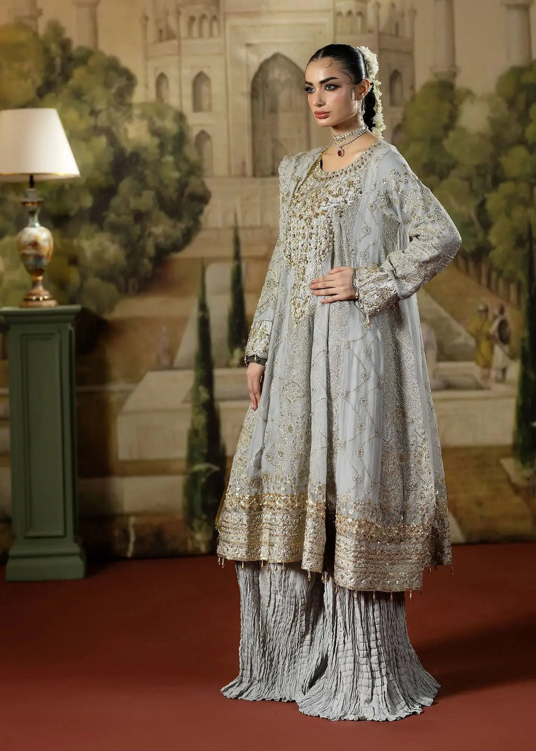 Side view of RANGREZA GRAY wedding outfit featuring detailed embroidery on chiffon frock and pleated raw silk trousers for formal occasions.