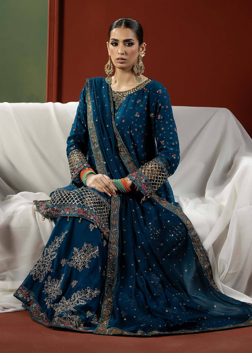 Elegant RANGREZA BLUE | M-909-16 peplum frock set featuring intricate embroidery and silk borders, perfect for traditional celebrations.