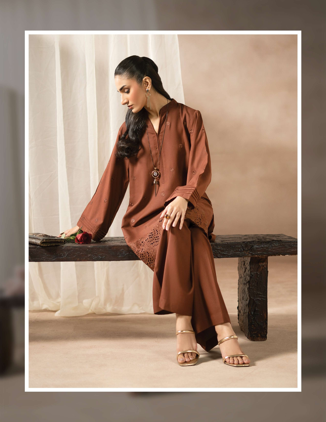 RANGREZA EA-51-3806 two piece set styled with accessories, showcasing intricate hem embroidery on the brown kurta and matching trousers.