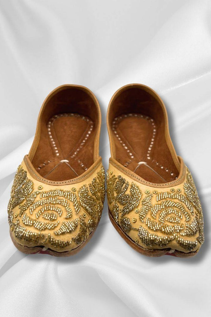 Mehr Golden Jutti - Khussa Shoes Ladies with square-toe design, featuring intricate hand-embroidery and gold beadwork on the toe cap.