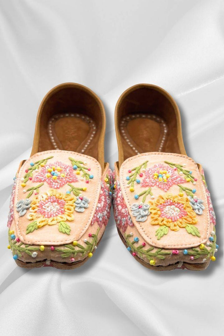 Front view of Rangrez Peach Jutti - Chic square-toe Pakistani Khussa with multicolor threadwork and handcrafted detailing for elegant footwear.