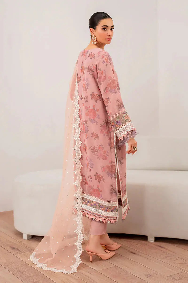 Back view of EMBROIDERED CHIFFON-SF-705 pink chiffon suit with floral print, embroidered borders, and scalloped dupatta in ceremonial clothing.