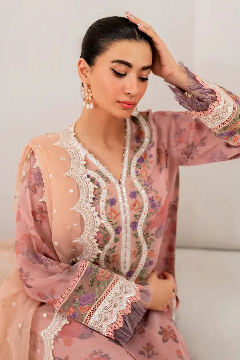 Close-up of EMBROIDERED CHIFFON-SF-705 neckline and sleeve embroidery with lace and pleated detailing in pink chiffon fabric.