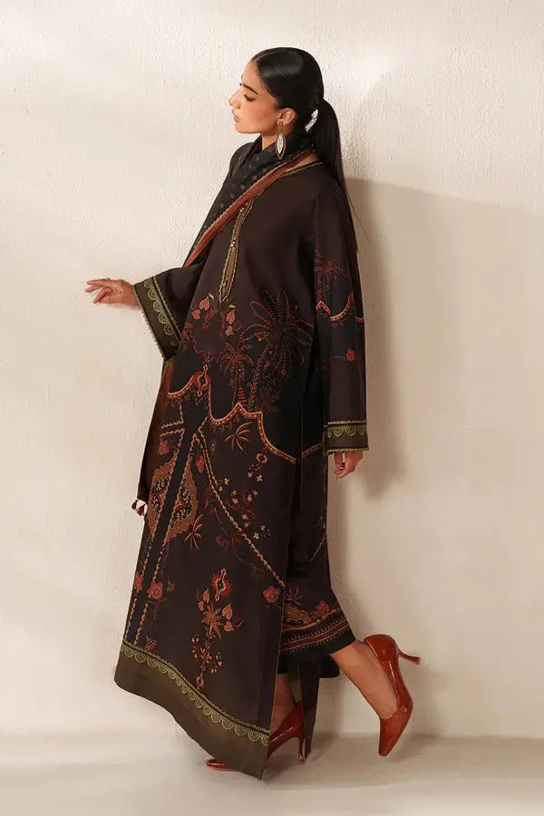 Full-length black embroidered kurta with floral and intricate designs, paired with matching dupatta and high heels, stylish ethnic outfit