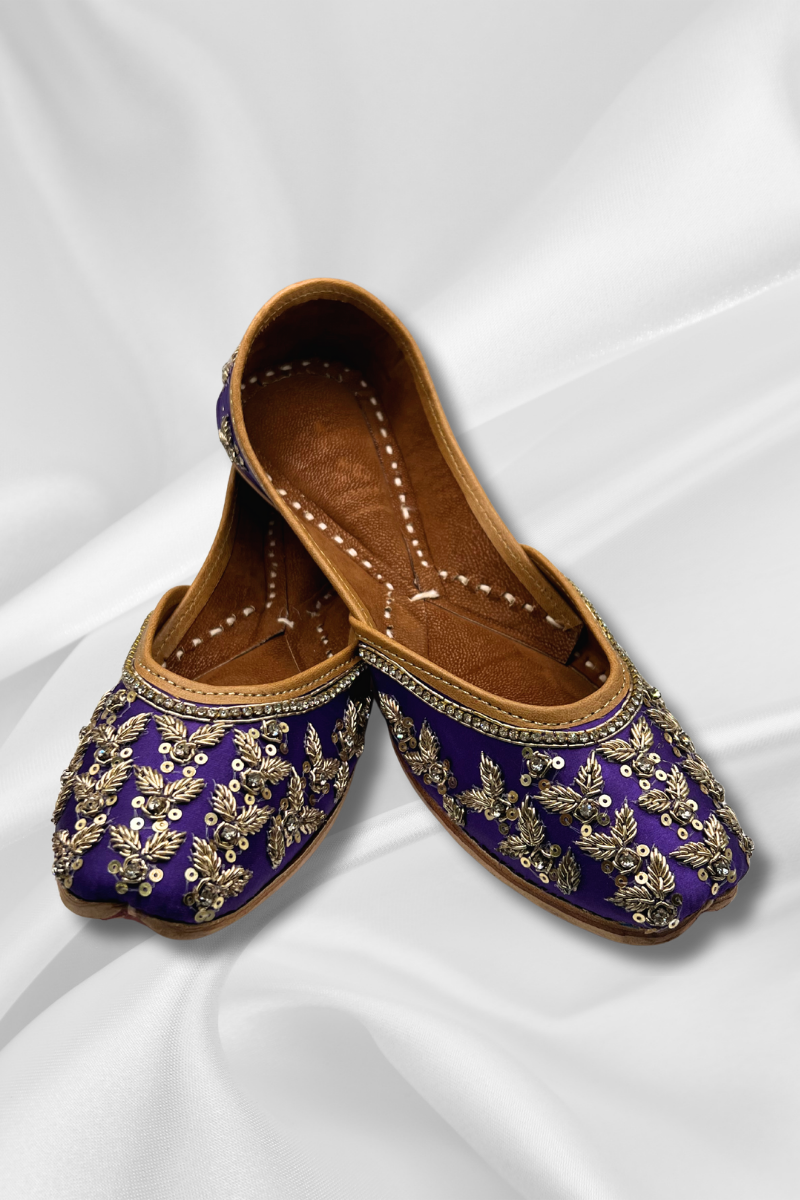 Amber Purple Punjabi Jutti for women featuring silver sequins and stone embroidery on rich satin. Ideal Khusa flats for festive and formal wear.