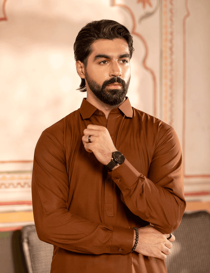 Detail view of RANGREZA MA-91 Rust Kameez Shalwar highlighting button placket and wrist accessories, ideal for Eid celebrations.