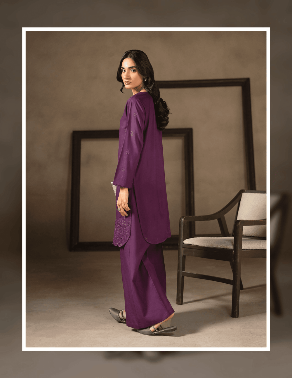 Back view of RANGREZA EA-45-38 Pakistani two piece outfit featuring a long embroidered kurta and matching trousers in rich purple.