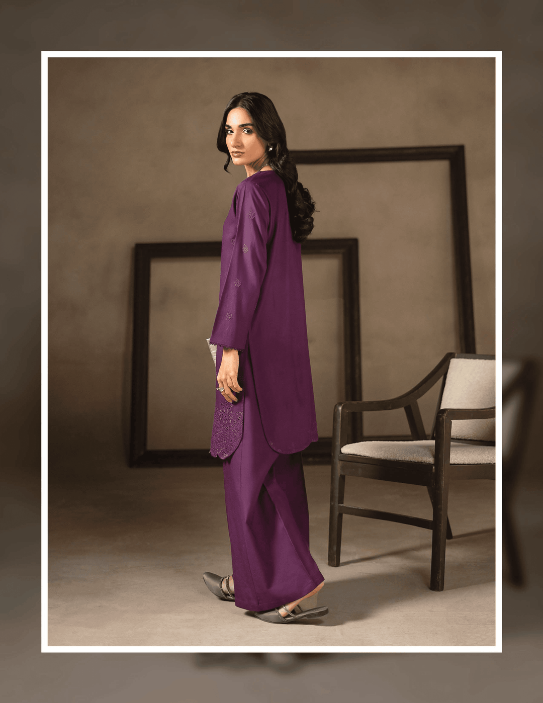 Back view of RANGREZA EA-45-38 Pakistani two piece outfit featuring a long embroidered kurta and matching trousers in rich purple.