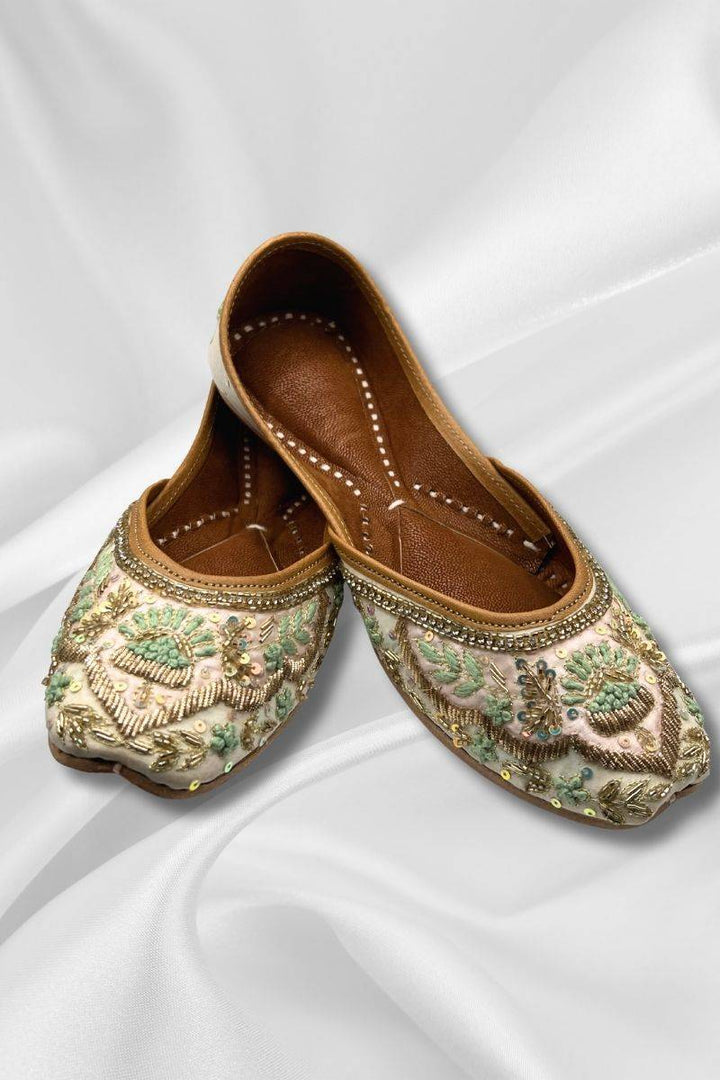 Zari Offwhite Khussa - Pakistani loafer jutti with teal floral embroidery, handcrafted for festive wear. Features intricate bead and thread work.