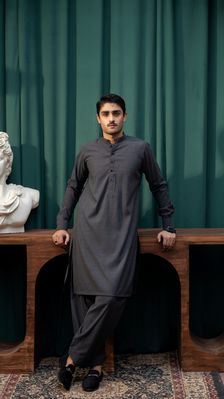 Dark grey traditional men's kurta pajama by Rangreza, MA-07-55, styled with black loafers, perfect for ceremonial occasions.