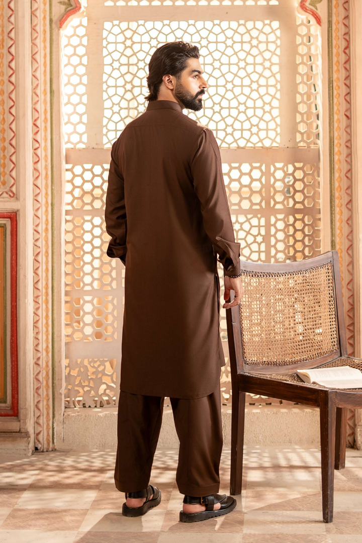 Back view of RANGREZA | MA-99 brown shalwar kameez for men, highlighting the clean tailoring and premium fabric for event wear.