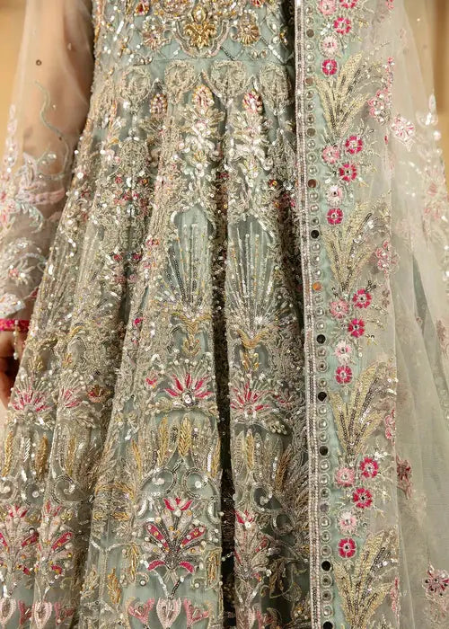 Detailed embroidery on the lower half of the Wedding Maxi Dress featuring floral and sequin patterns in pastel hues.
