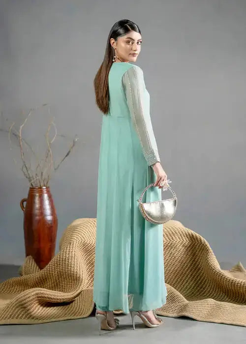 Side view of Rangreza Chiffon 2 Piece green dress with matching handbag and heels