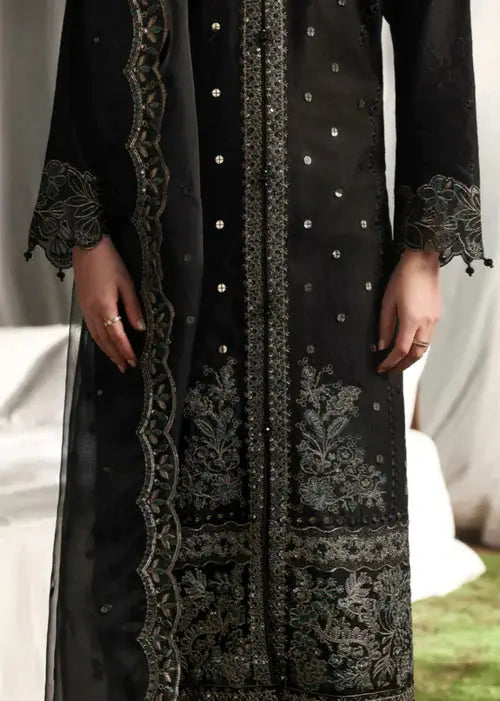 Black embroidered traditional dress with intricate silver details