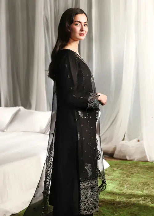 Side view of black embroidered kurta with dupatta for traditional occasion
