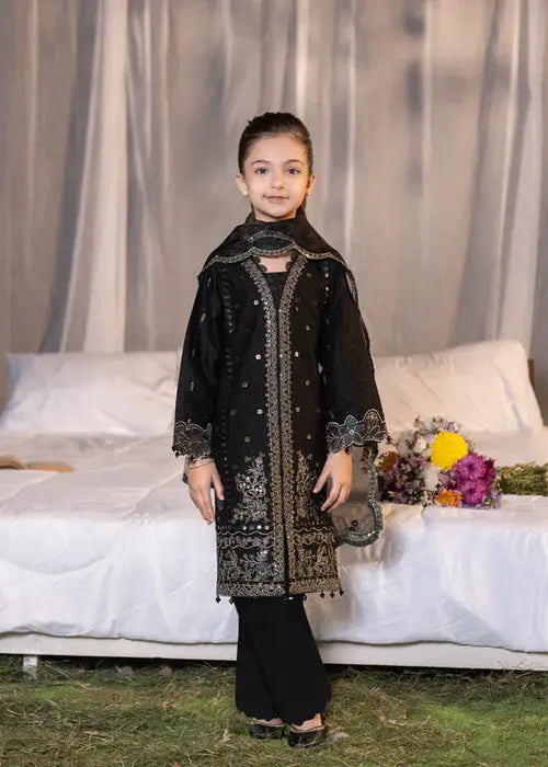 Front view of girl in black embroidered traditional dress