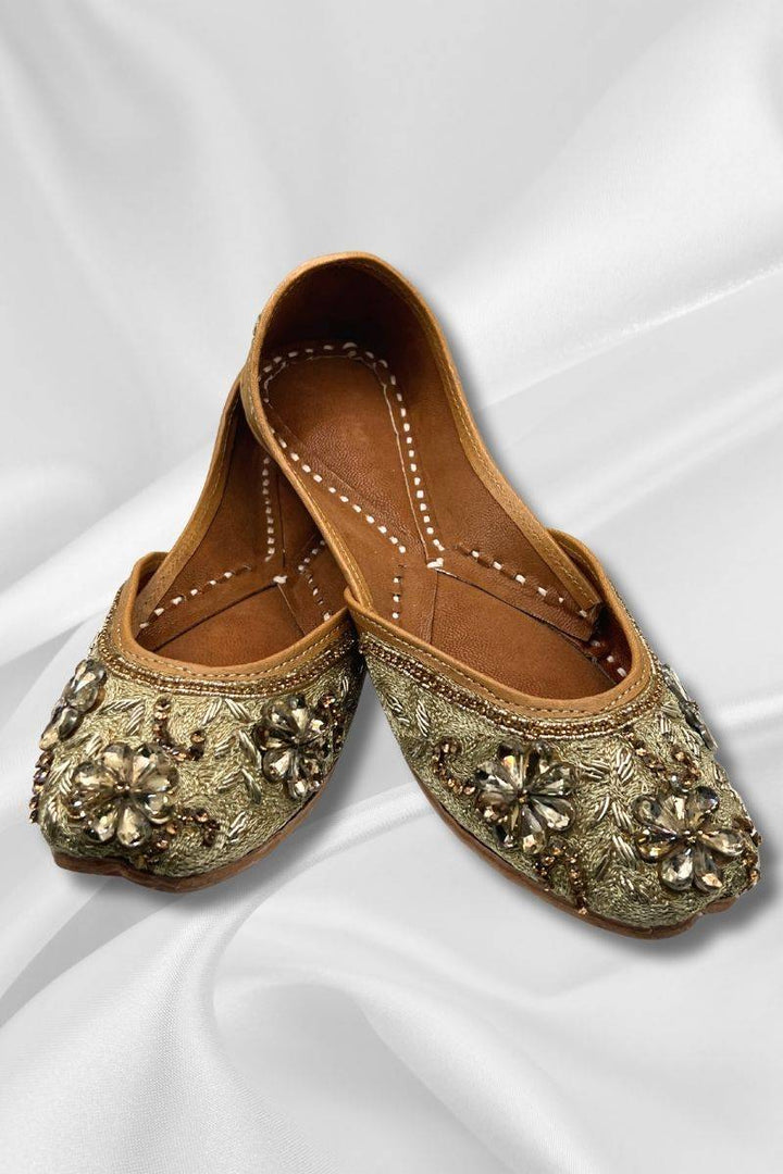 Sajawat Golden Jutti with soft padding and intricate floral embroidery, ideal for festive wear and traditional events like Sangeet.