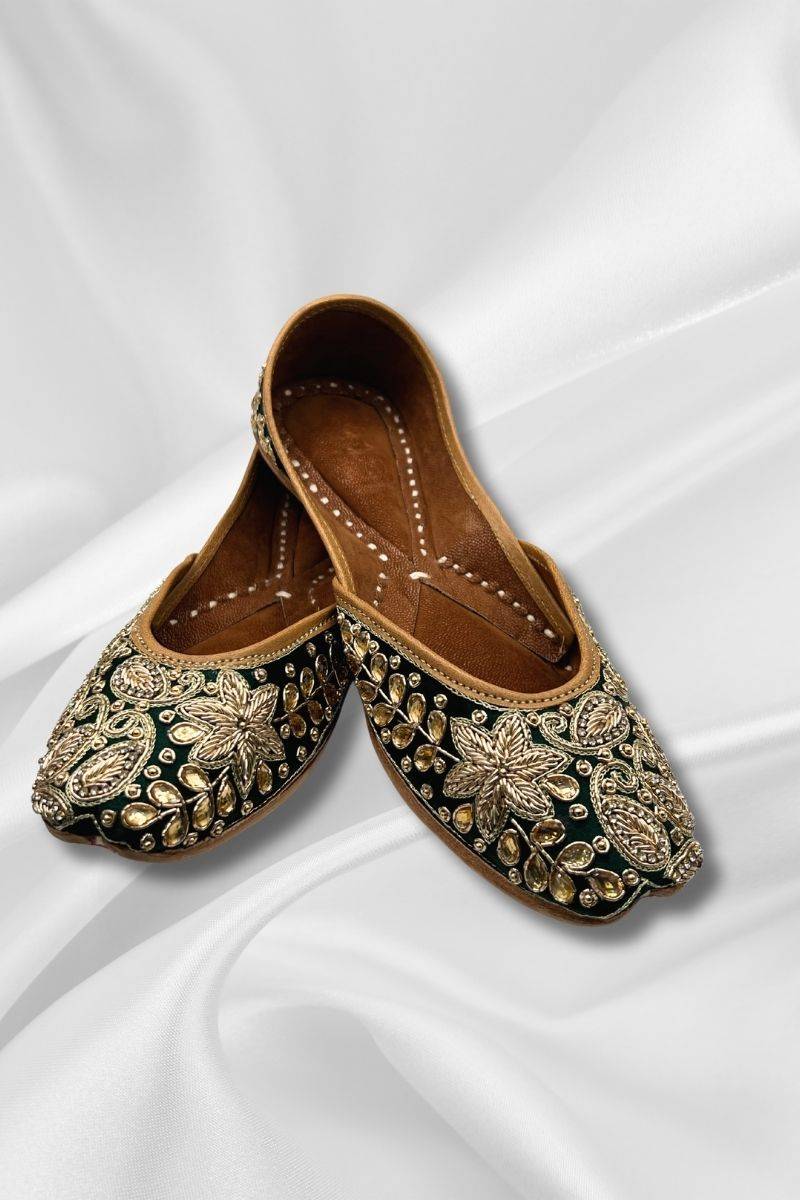 Gul Leather Jutti in forest green with gold zari embroidery on velvet silk base, ideal for traditional wear and festive occasions.