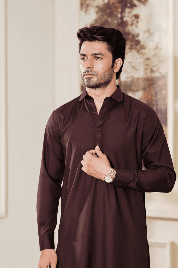 Close-up of EXCLUSIVE KAMEEZ SHALWAR - Maroon MA-106 highlighting collar and button details in Wash N Wear fabric for men’s traditional clothing.