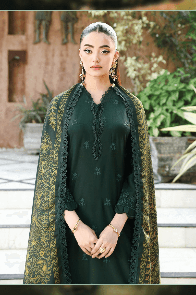 Close-up of rangreza AL-1130 green chikankari shirt with scalloped sleeves and printed wool shawl draped over shoulders.