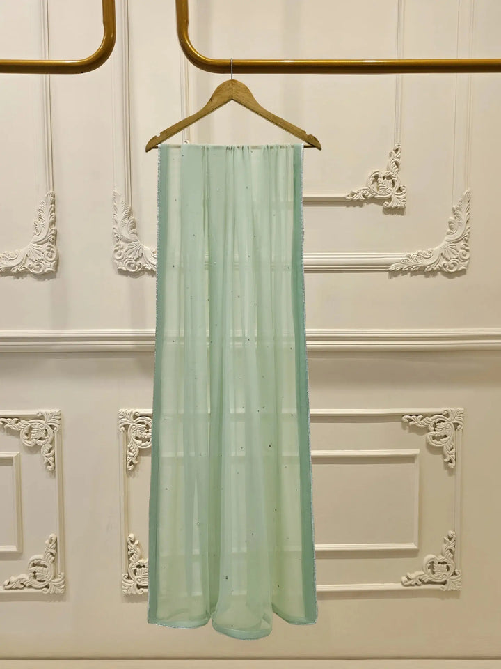 Mint green dupatta from Agha Noor 3 Piece Cotton Net Suit featuring subtle silver accents and sheer fabric.