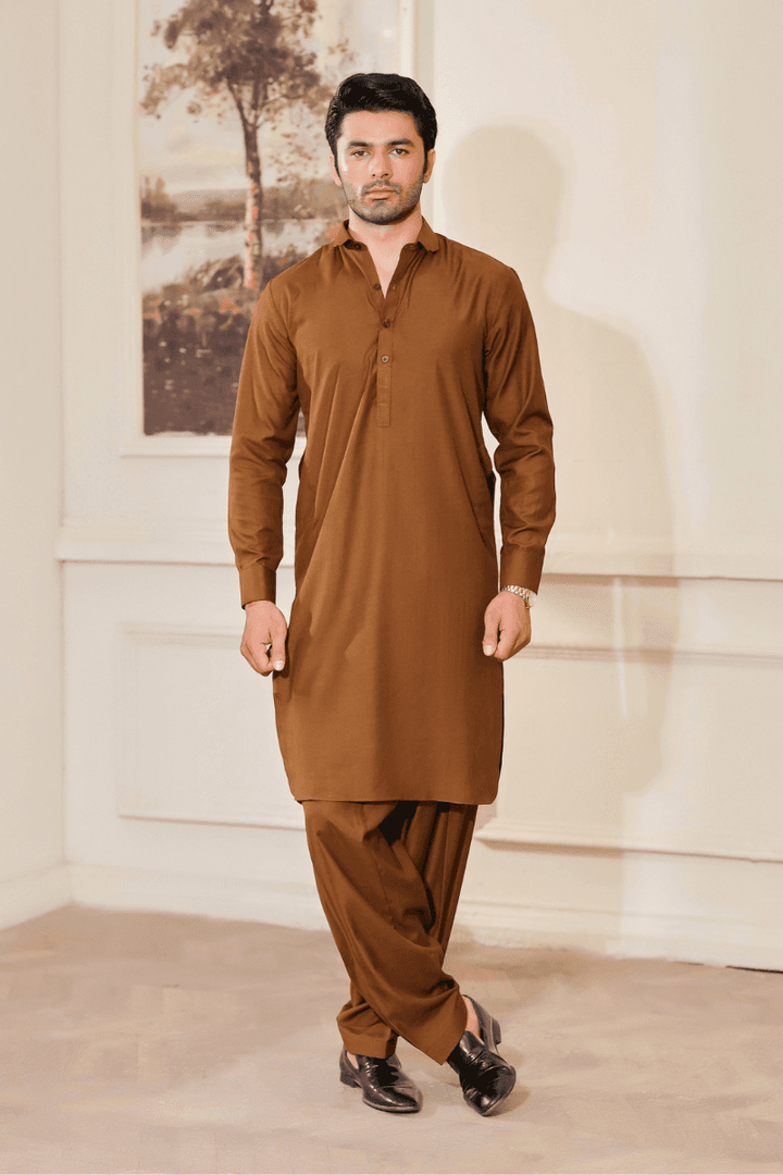 Shop Men Kameez Shalwar Brown Wash N Wear Fabric MA-107 featuring a classic straight-cut design with buttoned neckline, ideal for formal occasions.