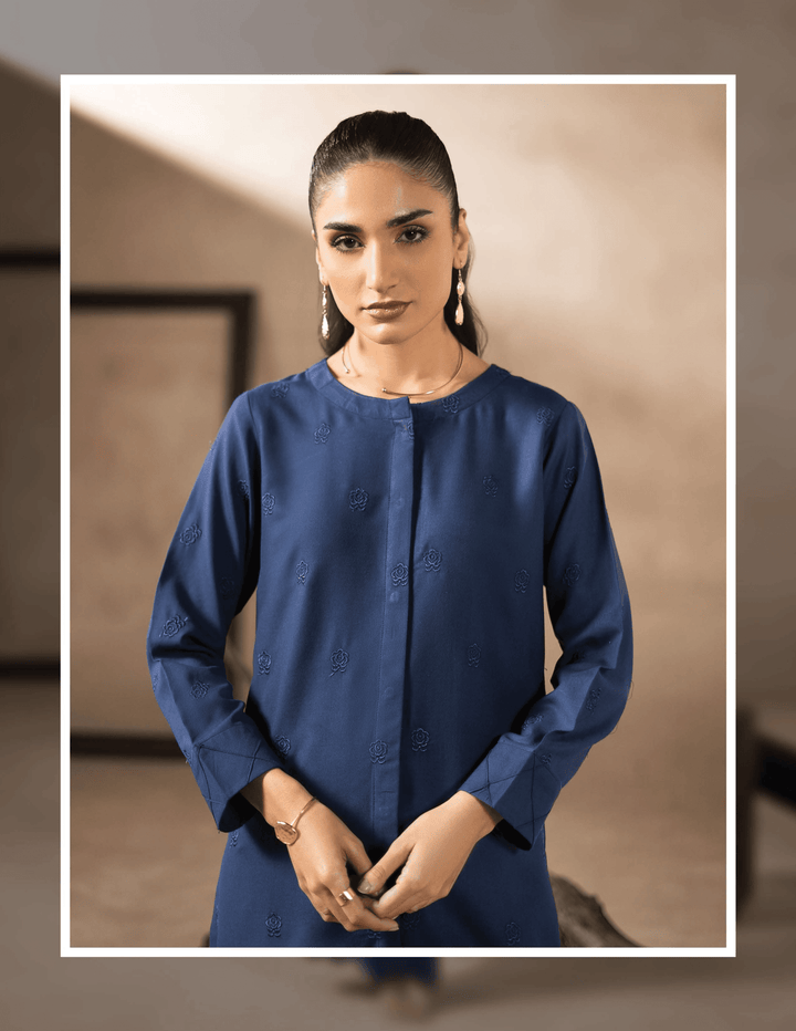 Close-up of RANGREZA EA-42-38 kurta featuring subtle embroidery and buttoned neckline, part of stitched Pakistani two piece suits for casual wear.
