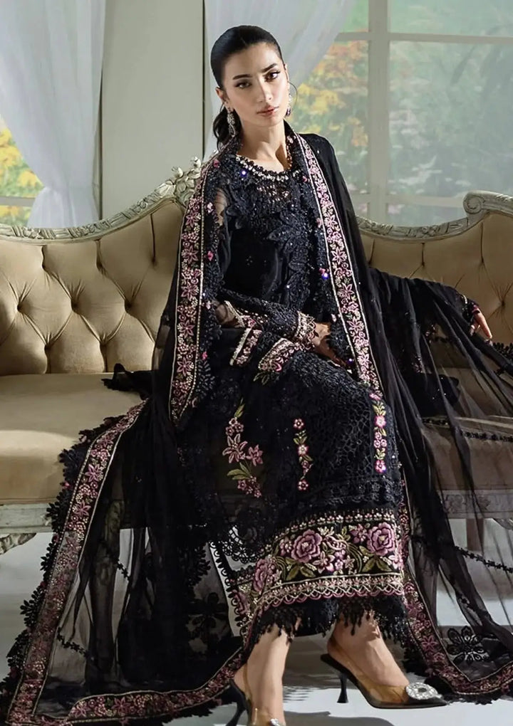 Model wearing RANGREZA | AL-4359 black 3-piece set with floral embroidery and lace detailing, showcasing Pakistani brands clothing elegance.