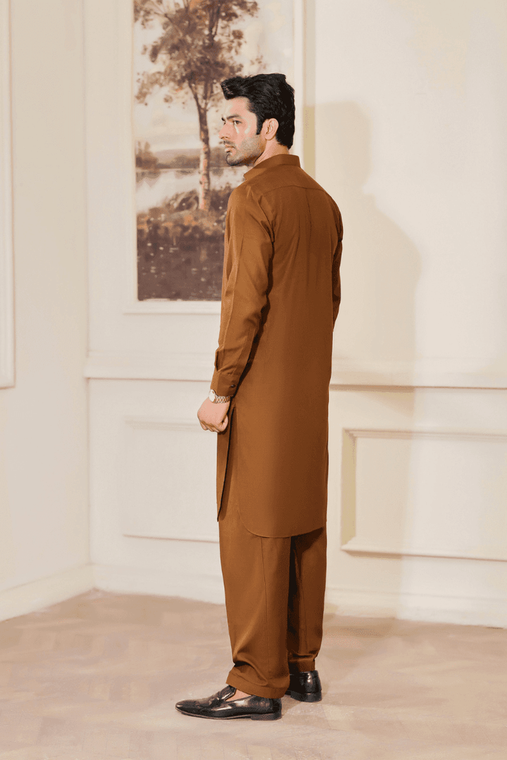 Back view of Men Kameez Shalwar Brown MA-107 showcasing tailored fit and premium wash n wear fabric for a sleek traditional appearance.