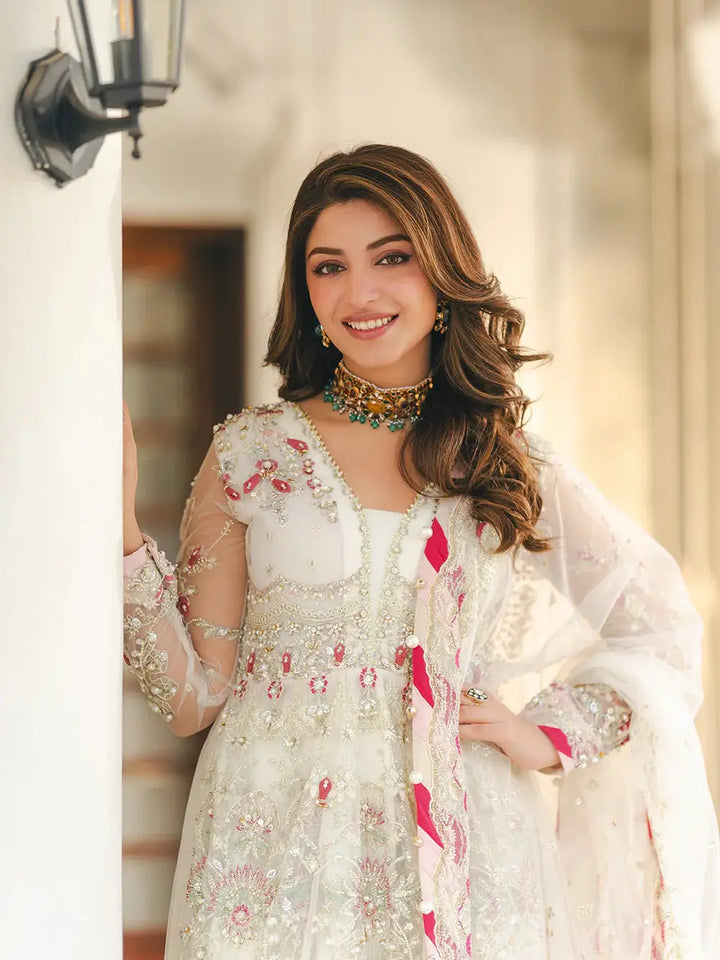 Elegant embroidered white net dress with sequin, adda work, pearls, and lace details, paired with matching dupatta for wedding attire