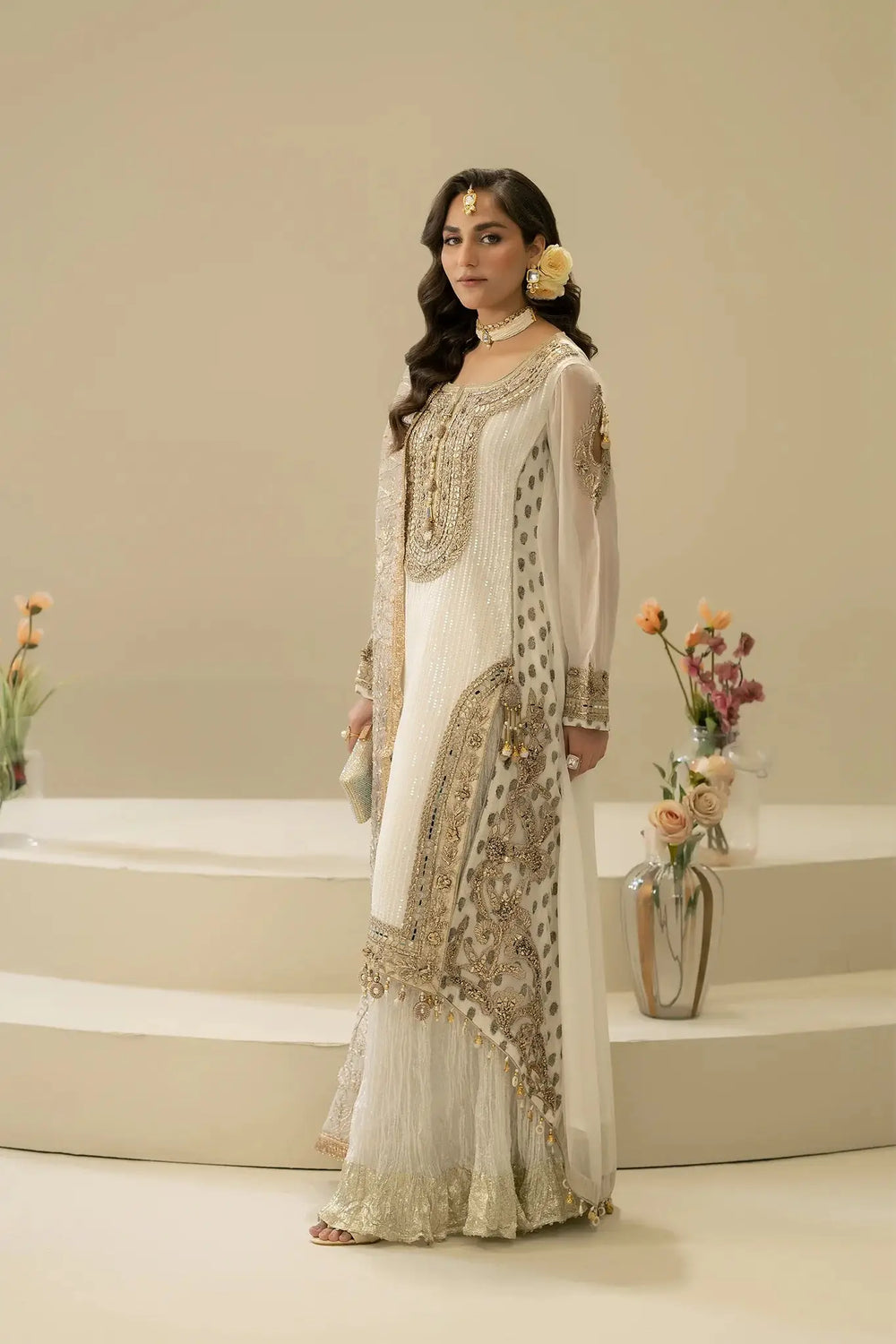 Elegant M-109 OFF-WHITE Pakistani outfit featuring intricate hand embroidery and embellishments, ideal for weddings and formal events.