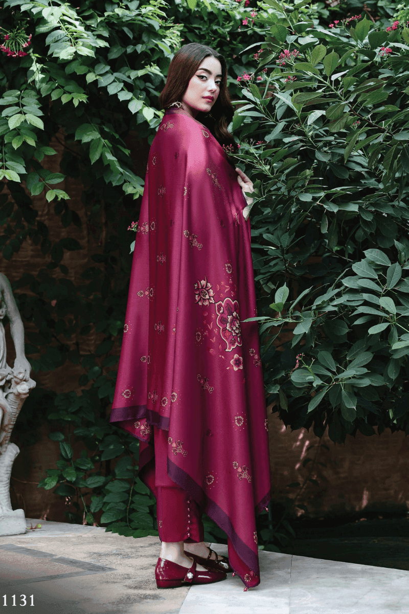 Side view of RANGREZA AL-1131 Pakistani womens clothes with floral wool shawl draped over embroidered maroon shirt and pants.