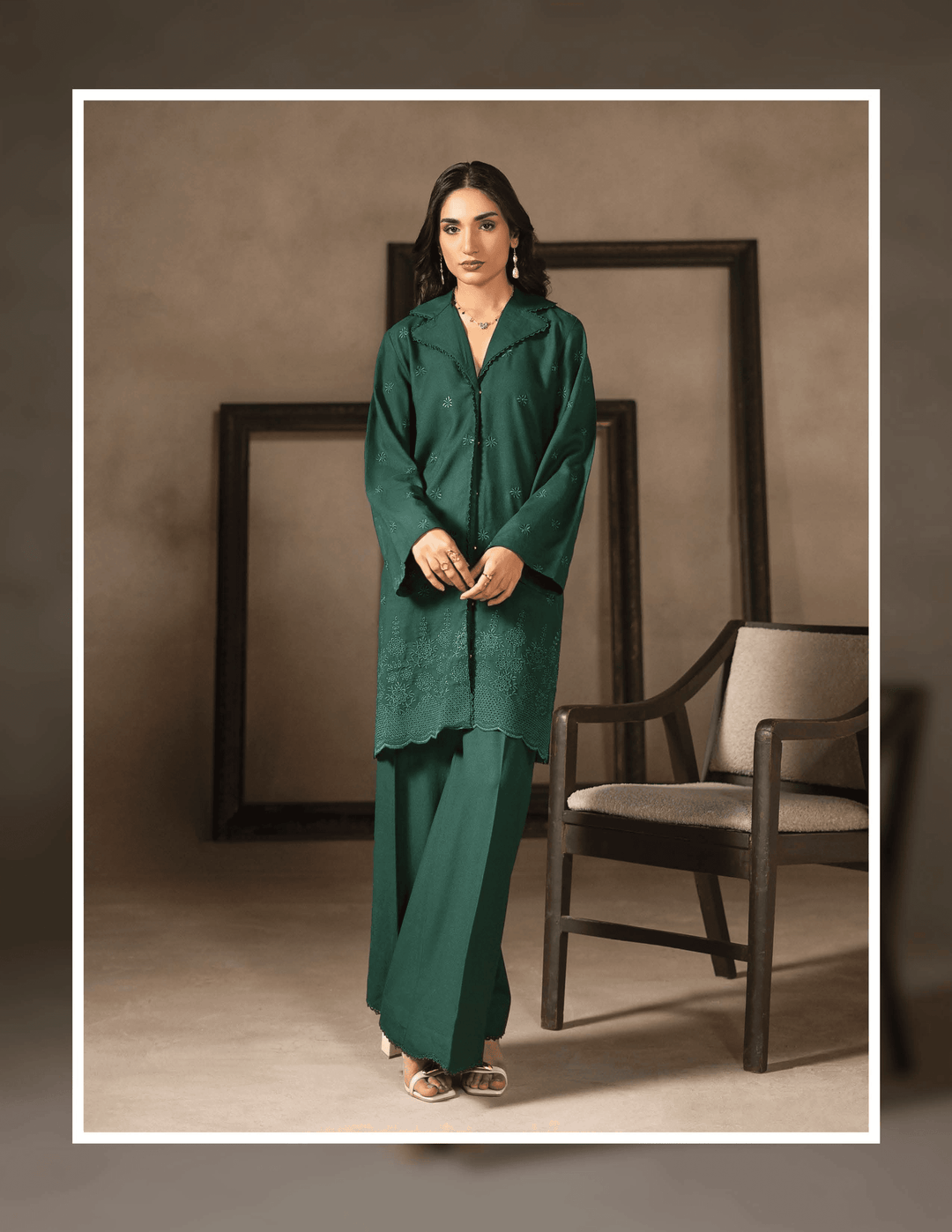 Shop RANGREZA EA-49-3804, a stylish green Pakistani two piece set featuring a long embroidered shirt and wide-leg pants for casual winter fashion.