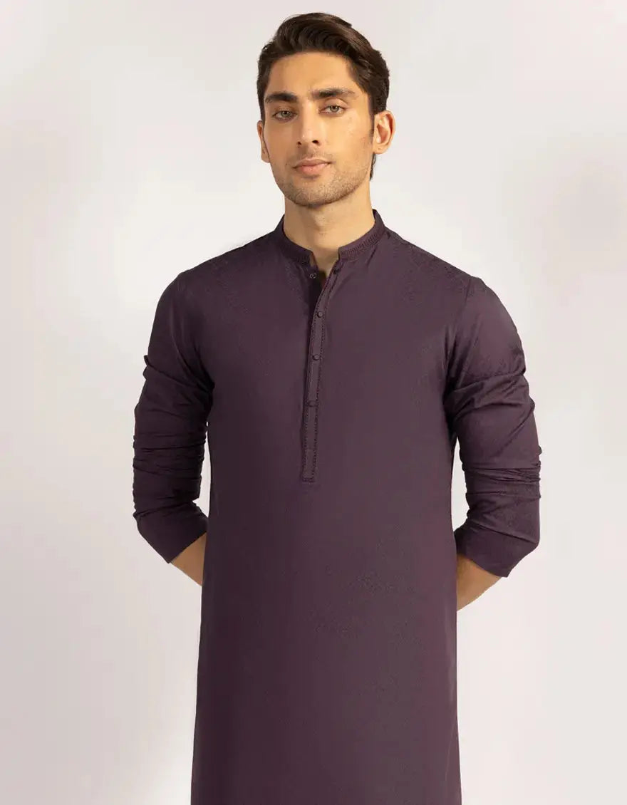 Purple Blended Semi-Formal Kurta by Junaid Jamshed featuring full sleeves and elegant textured fabric, perfect for traditional events.