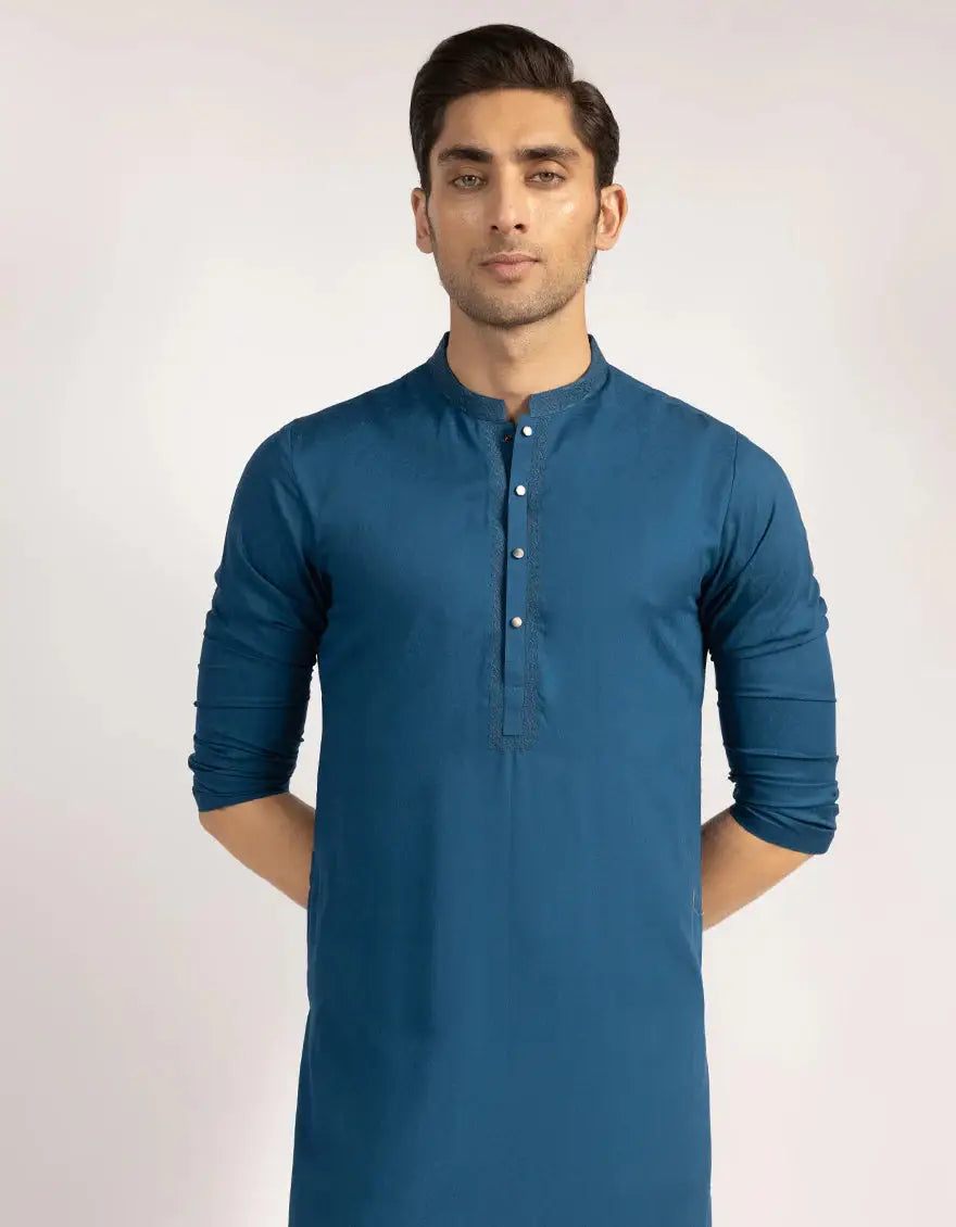 Close-up of Blue Blended Semi-Formal Kurta by Junaid Jamshed J. with buttoned placket and mandarin collar, ideal for stylish semi-formal wear.