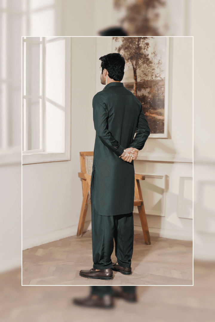 Back view of Exclusive Green Shalwar Kameez MA-101 for men, showcasing clean stitching and premium blended fabric in a traditional silhouette.