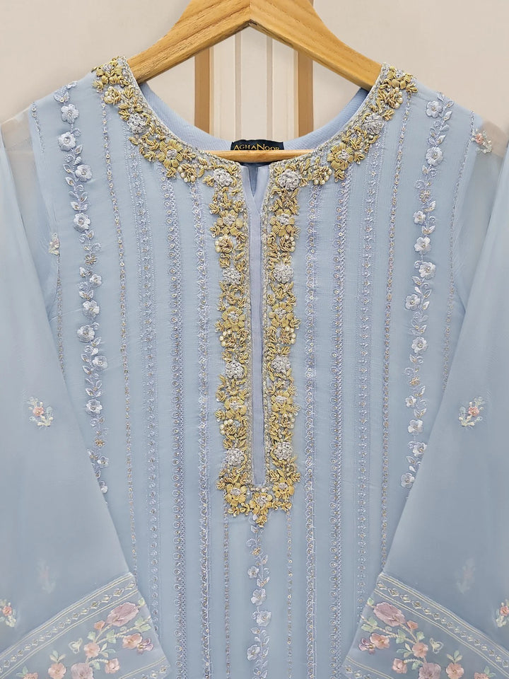 Detailed neckline embroidery on chiffon suit