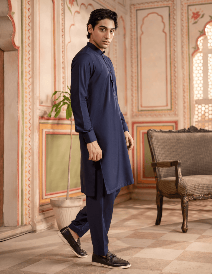 Pakistani men's salwar suit RANGREZA MA-92 in deep blue, featuring a classic kameez shalwar design with buttoned neckline and tailored fit.