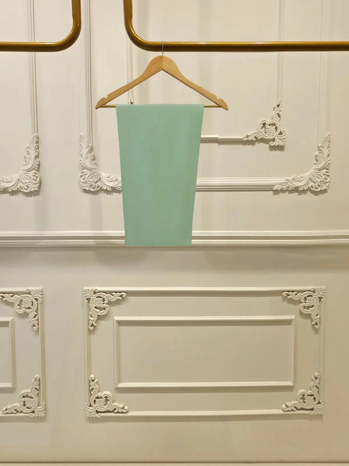 Silk bottom of AGHA NOOR 2 Piece Suit in matching mint green, complementing the embroidered cotton net shirt for a complete ethnic outfit.