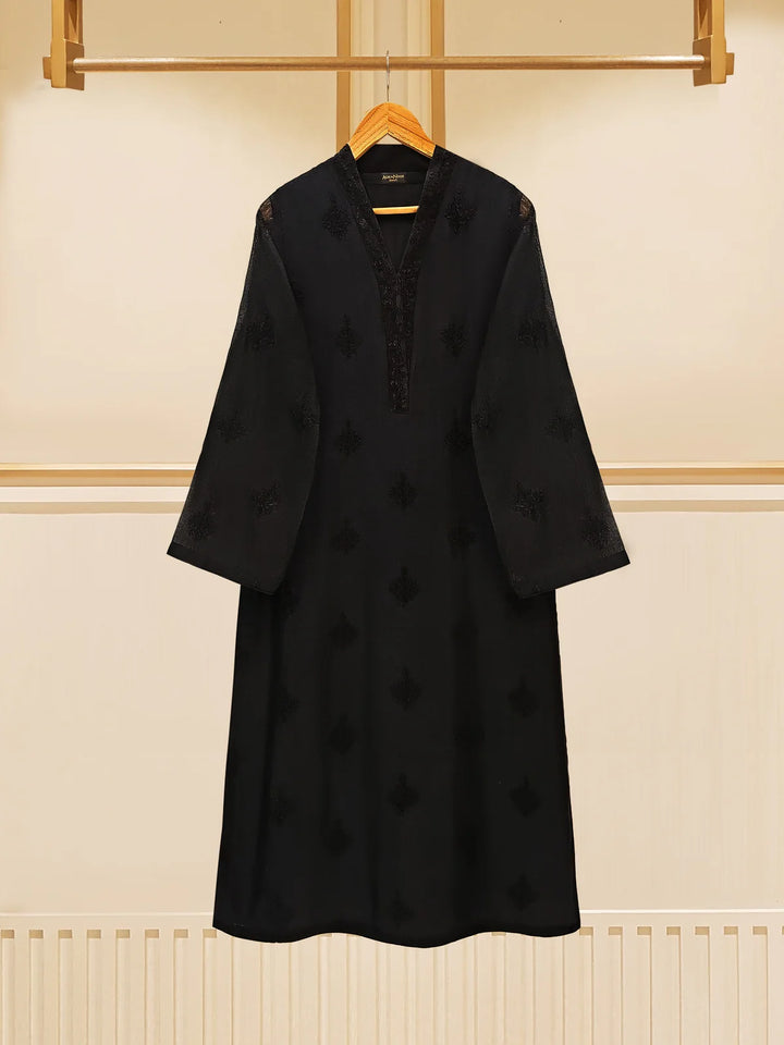 Front view of black embroidered cotton net suit