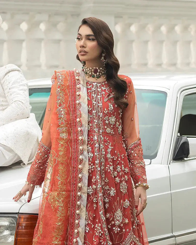 AROOSH Pakistani dress AR-103-2200 with detailed floral embroidery and organza dupatta, styled for a wedding event. A standout in traditional wedding wear.