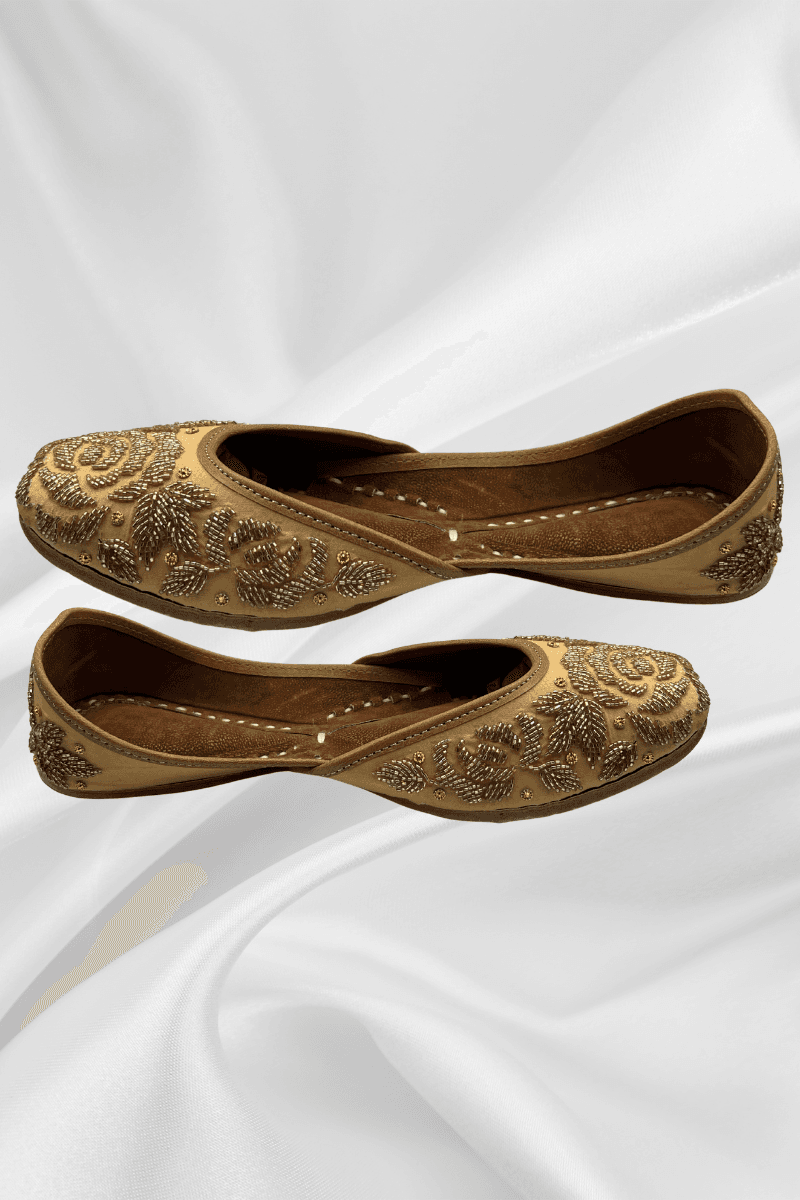 Side view of Mehr Golden Jutti - Khussa Shoes Ladies showcasing detailed floral hand-embroidery and elegant golden embellishments.
