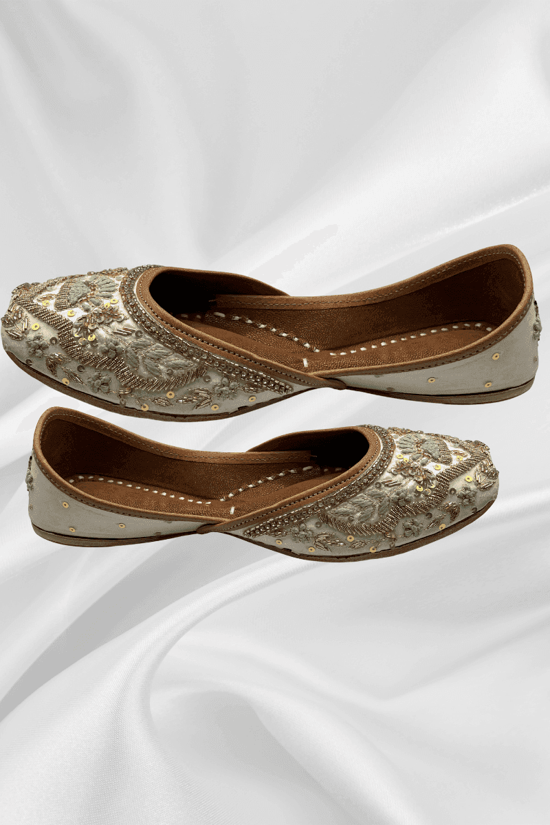 Side view of Zari Offwhite Khussa - elegant offwhite flats with detailed floral embellishments, perfect for ethnic and formal occasions.