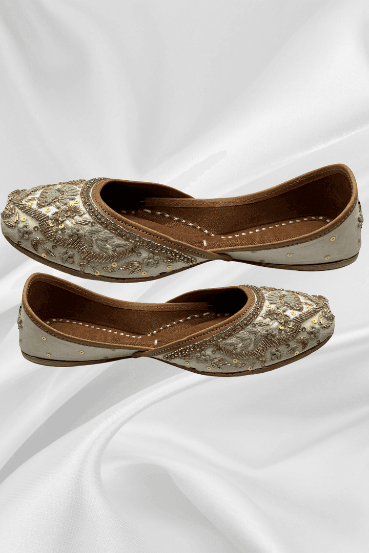 Side view of Zari Offwhite Khussa - elegant offwhite flats with detailed floral embellishments, perfect for ethnic and formal occasions.