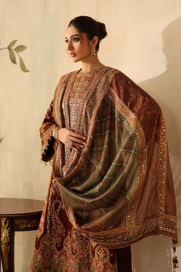 Side profile of woman in embroidered velvet dress